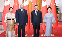 习近平会见汤加国王图普六世