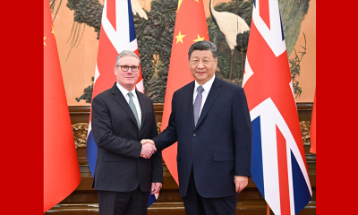 习近平会见英国首相斯塔默