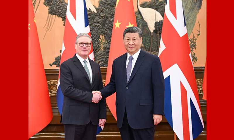 习近平会见英国首相斯塔默