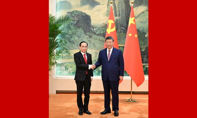 习近平会见越共中央总书记特使黎怀忠